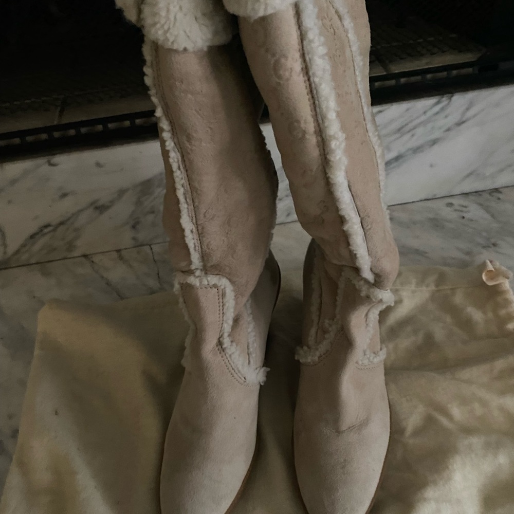 Gucci suede  wedge boots. With a small spot indicated in photos. Size 8 1/2 B